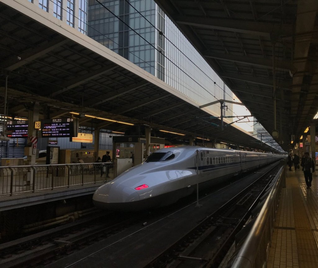 Tokaido Shinkansen train waiting at a platform in Tokyo Station